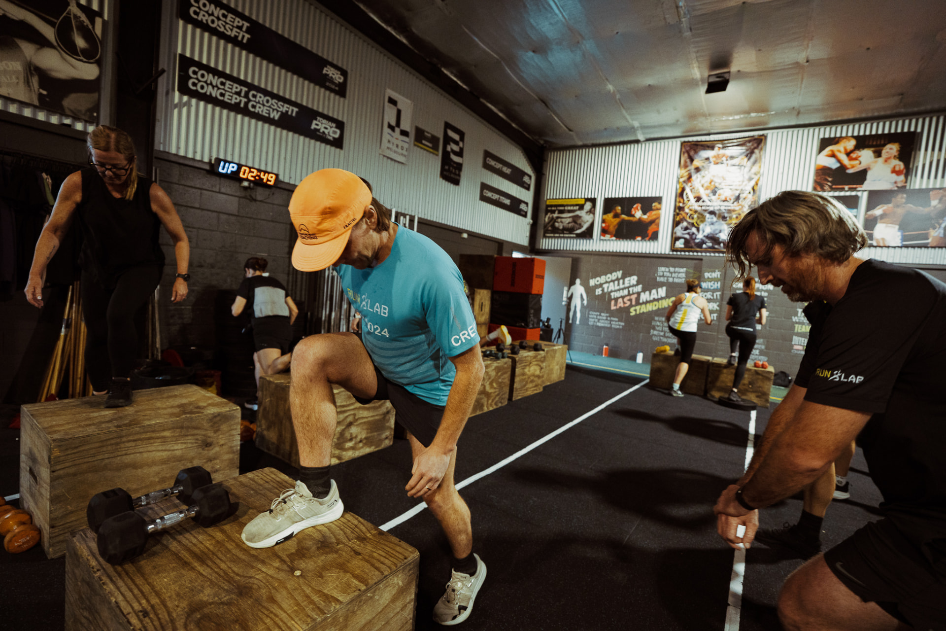 RunLab crew doing step-ups on boxes during a strength session